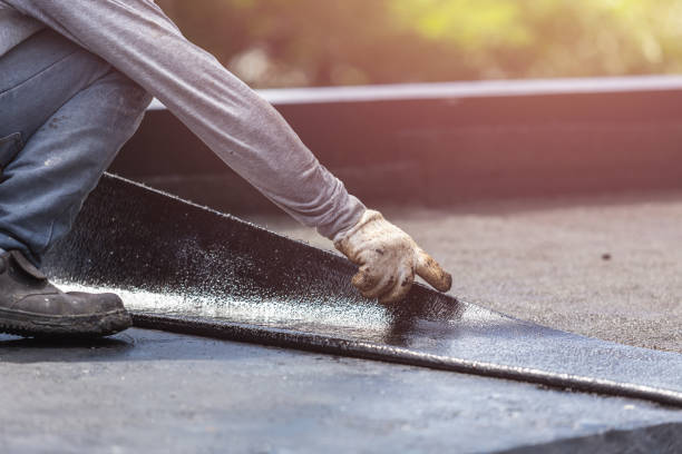 Professional Basement Waterproofing technician working in Olmsted Falls, OH